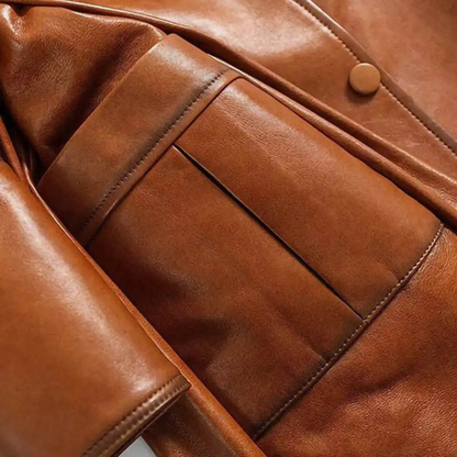 Tan leather trench coat collar and button detail